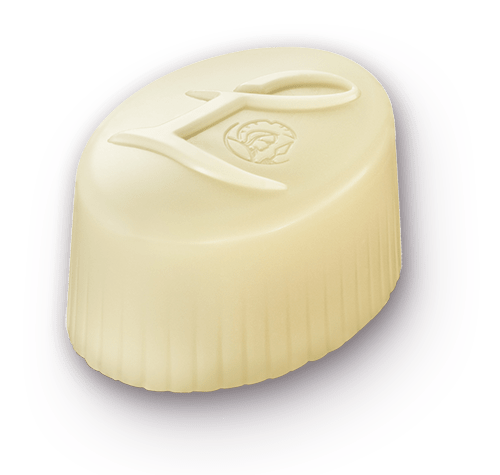 LOUISE NOISETTES WHITE: Praliné de avellanas sabor caramelo, con avellanas caramelizadas.